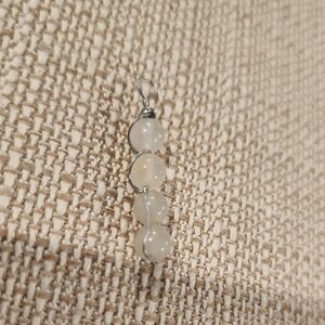 Elegant Silver and White Beaded Pendant